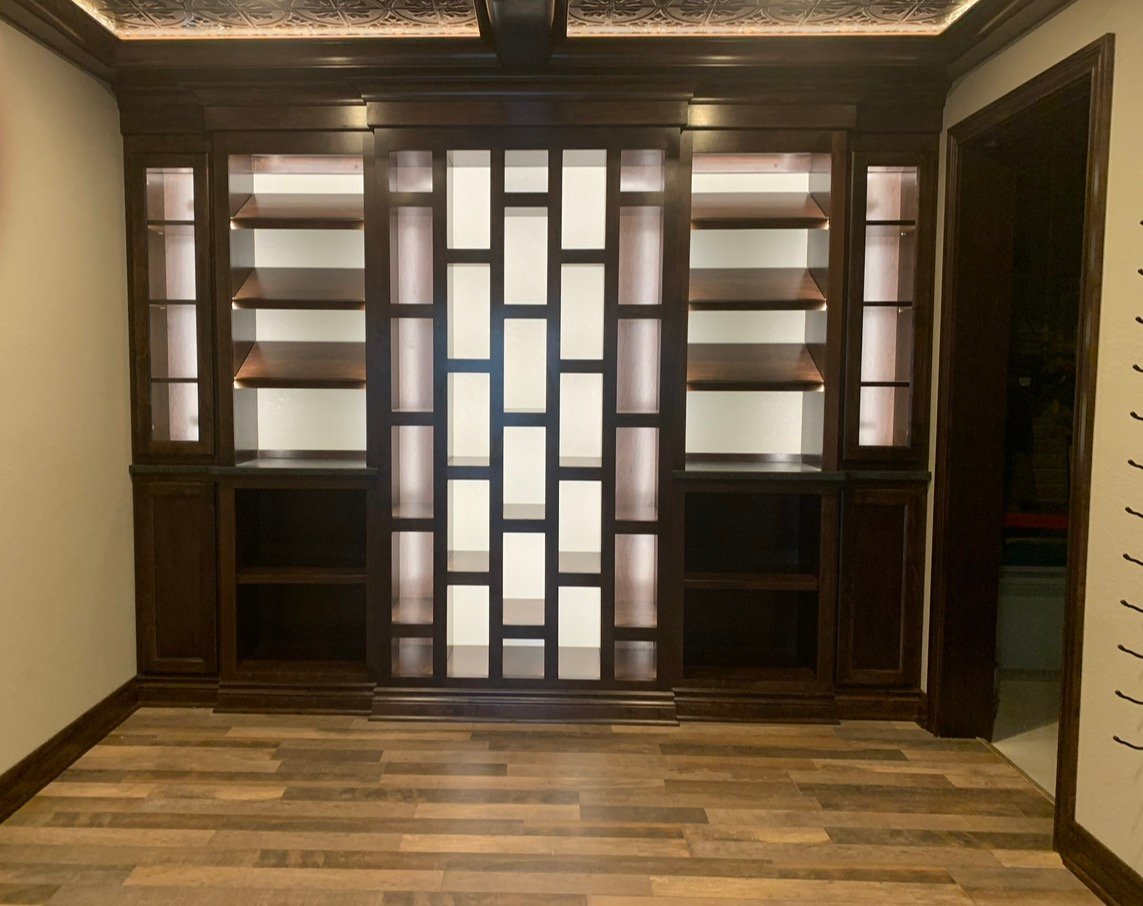 Luxury cabinets with LED lighting installed by Infinity Wood Works